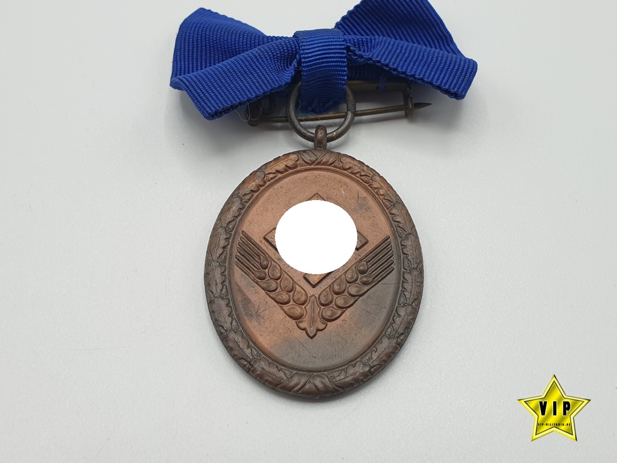 Dienstauszeichnung Reichsarbeitsdienst für weibliche Jugend 4. Stufe in Bronze Dienstauszeichnung Reichsarbeitsdienst für weibliche Jugend 4. Stufe in Bronze
