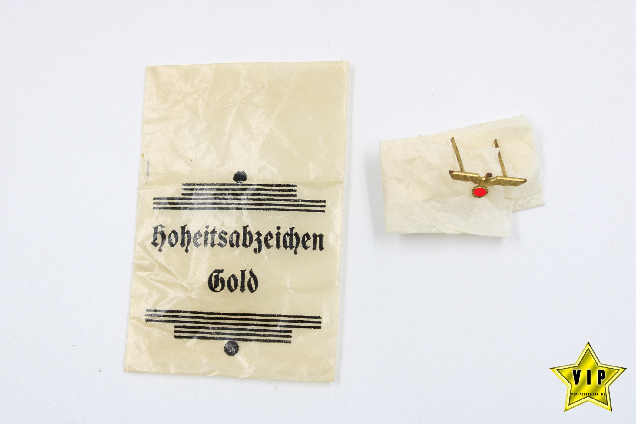 Hoheitsabzeichen/Adler in Gold in Tüte 