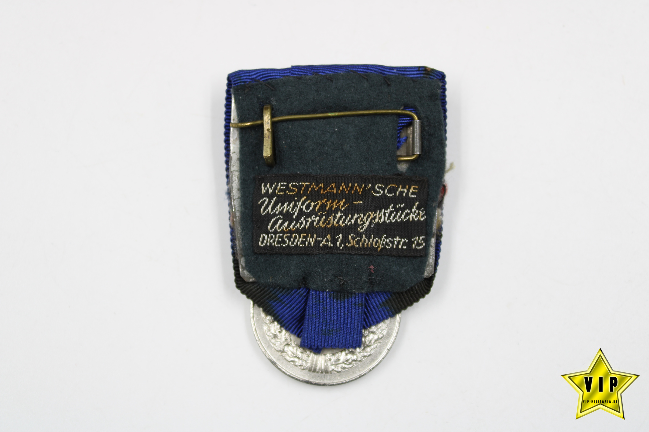 Wehrmacht Dienstauszeichnung 4. Klasse 4 Jahre an Einzelspange mit Luftwaffeadler und Schneider Etikett